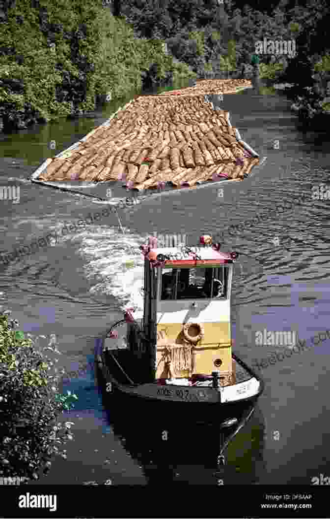 A Historic Towboat Navigating The Allagash River, Towing A Massive Log Boom Through A Tranquil Forest Setting Allagash River Towboat: A Maine Logging Adventure