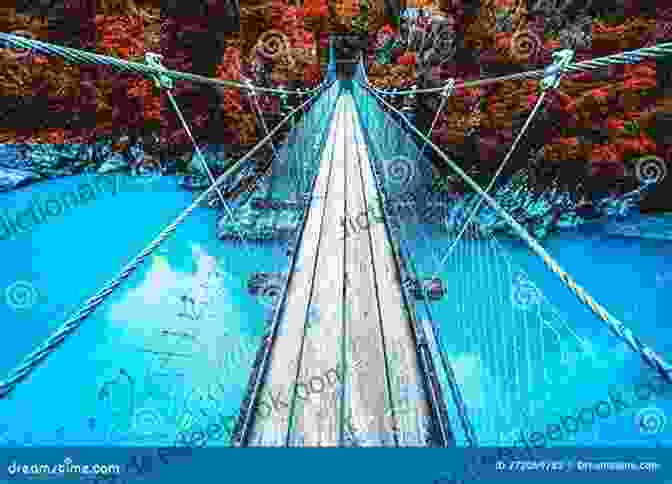 A Majestic Suspension Bridge Soaring Over A Tranquil River, Its Cables Reaching Towards The Sky Like Delicate Harp Strings. Bridges Picture Joel Patterson