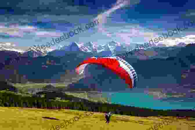 A Paraglider Soaring Over The Swiss Alps Switzerland Adventure Guide (Adventure Guides)