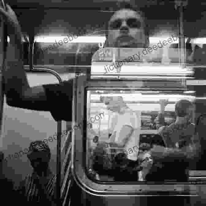 Landon Looking Out The Window Of A Subway Train, Reflecting On His Journey Landon Rides The Subway Diana Perez